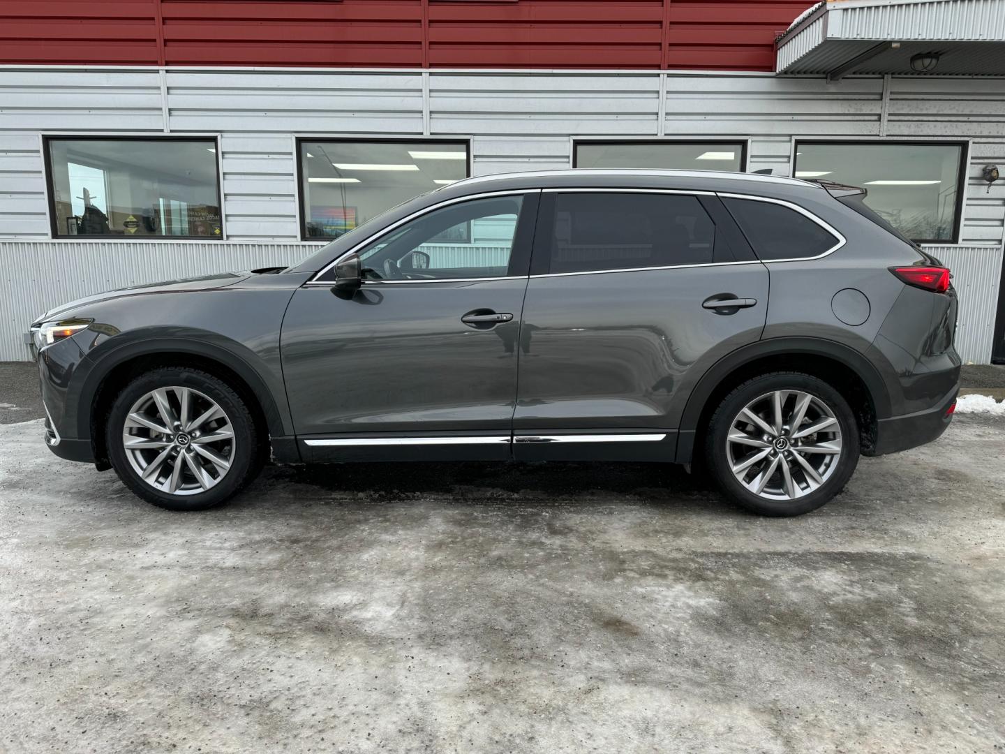 2021 Gray /Black Mazda CX-9 Grand Touring AWD (JM3TCBDY5M0) with an 2.5L L4 DOHC 16V engine, 6A transmission, located at 1960 Industrial Drive, Wasilla, 99654, (907) 274-2277, 61.573475, -149.400146 - Photo#2